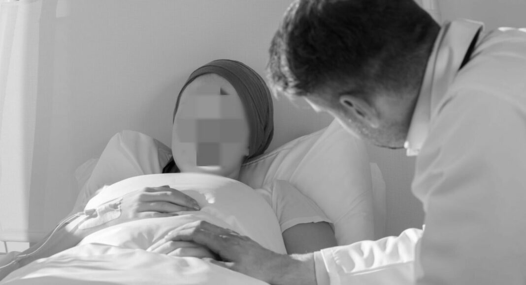 Arzt mit kranker Patientin