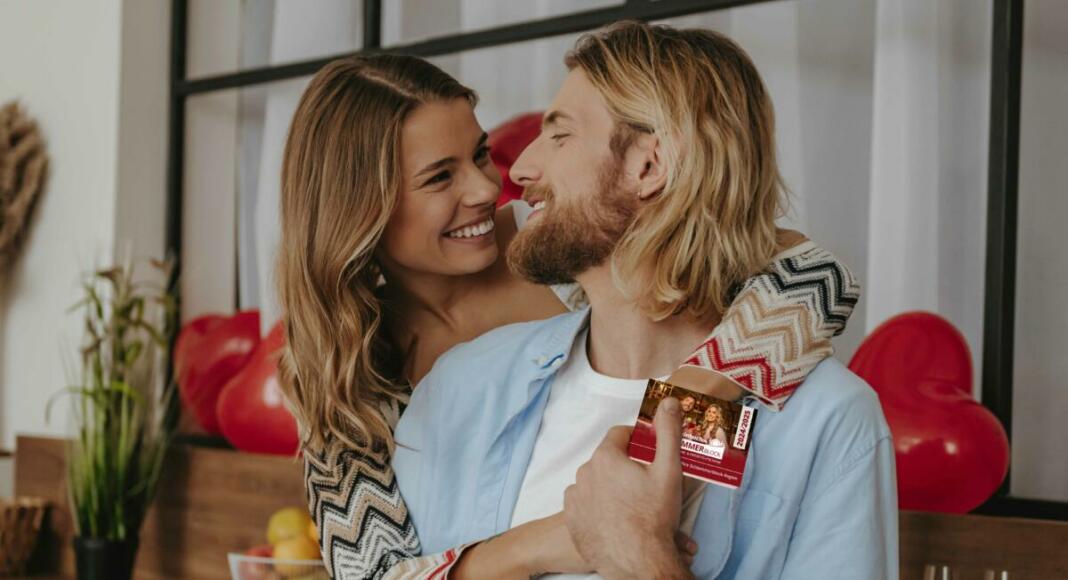 Young,Loving,Couple,Embracing,And,Smiling,While,Celebrating,Valentines,Day